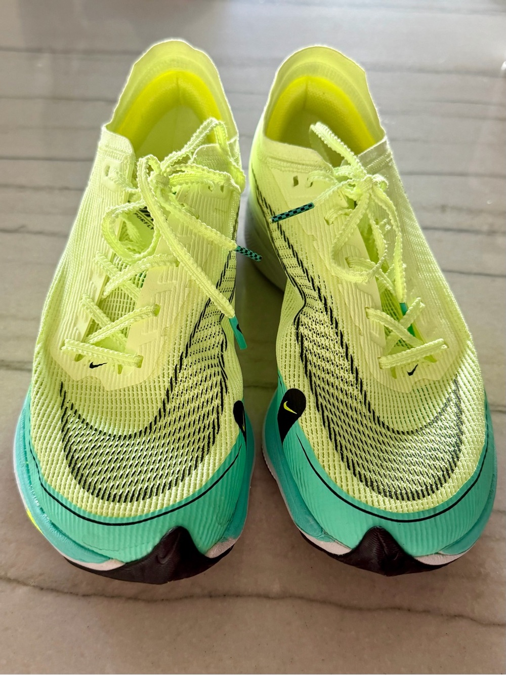 Nike Women's Vaporfly Running Sneakers in Neon Yellow and Teal, size 9.5